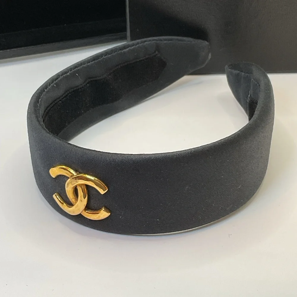 CHANEL Black Headband with Gold Logo Accent